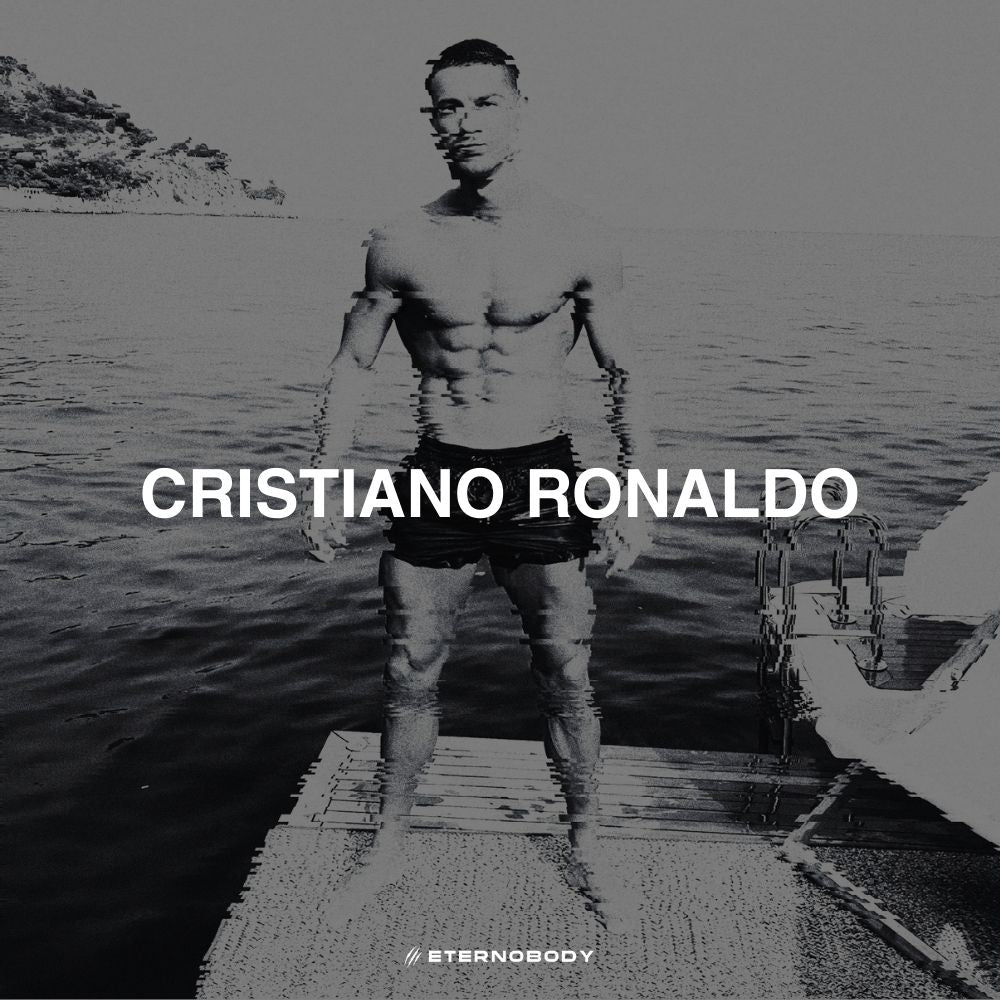 Black and white image of a shirtless Cristiano Ronaldo standing in water on a wooden platform. The text "CRISTIANO RONALDO" is overlaid in the center.