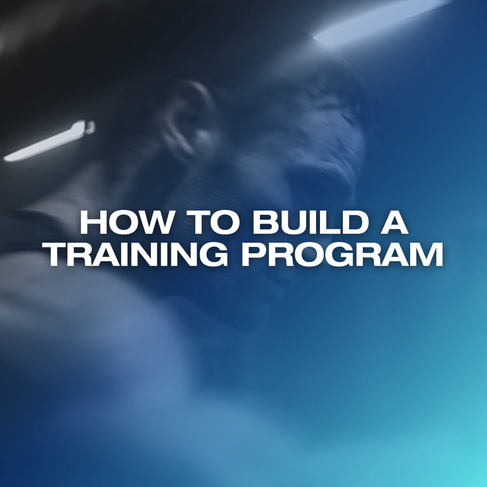 ETERNO blog feature image for How to Build a Training Programme From Scratch — black and white editorial photograph of a man training in a dark gym with a blue-teal gradient overlay